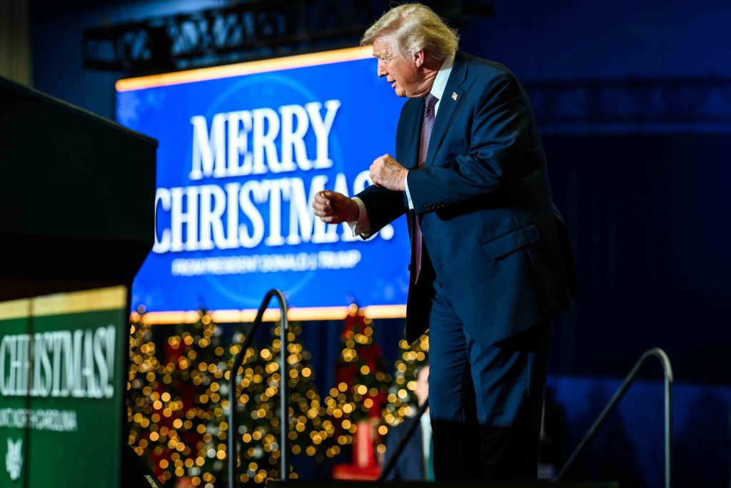 President Donald Trump gestures to the crowd after delivering remarks on the economy at the Rocky Mount Event Center in Rocky Mount